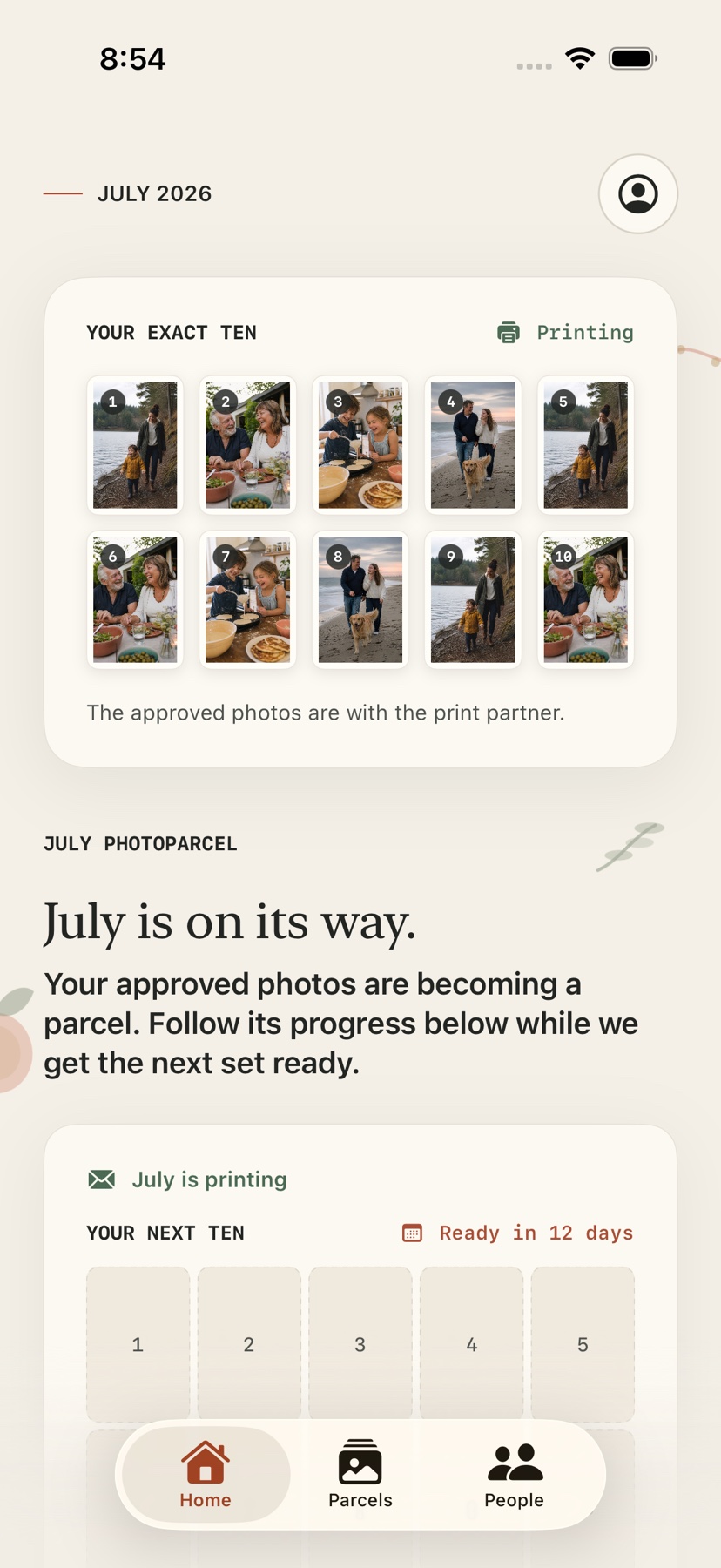 PhotoParcel monthly home with the customer’s exact ten photos and next monthly set front and center