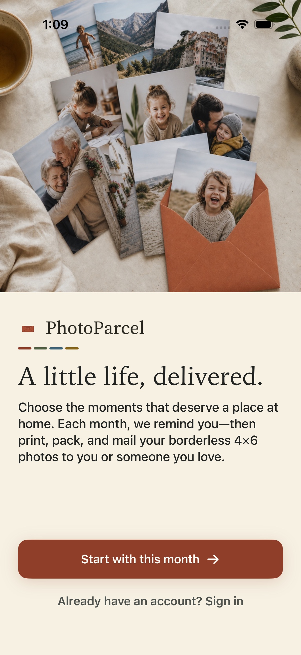 PhotoParcel welcome screen with the current brand lockup, terracotta start button, and a rotating photo of prints beside an envelope